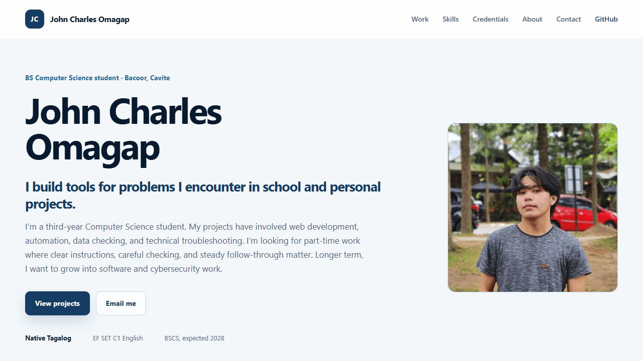 Deployed editorial portfolio with light blue background, large name, project evidence, and portrait
